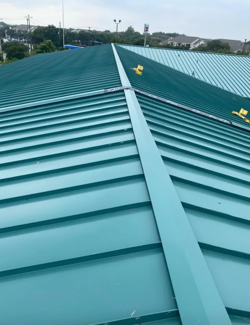 Green commercial metal roof ridge and valley for Metal Roof Repair in North Bay Village